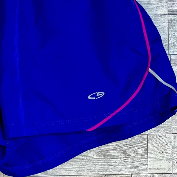 Royal Blue Running Shorts w/Pink Trim. Ladies- size L (has reflective markings) - Picture 5 of 11